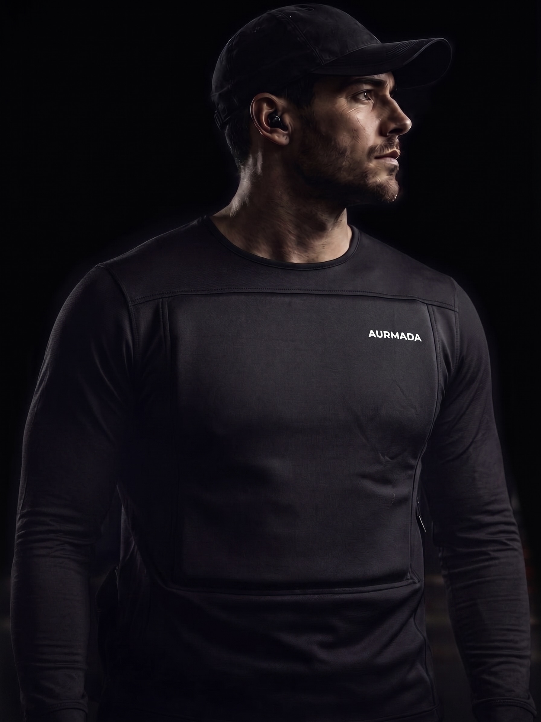 Layer 1 Shield long sleeve worn in a dark studio